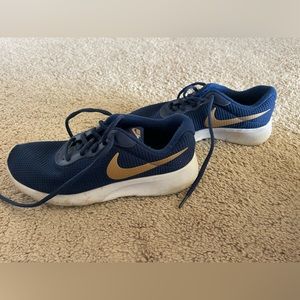 Nike boys sneakers.  Used.  Fair condition